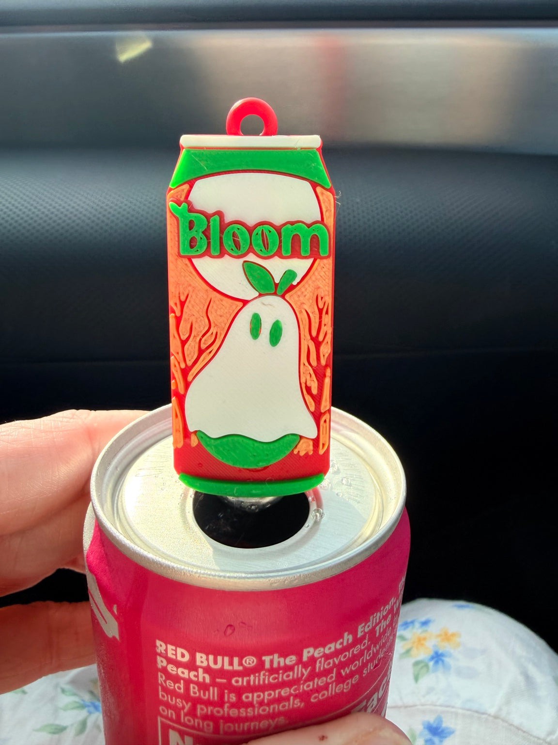 Ghosted by Fall PopOff tool lifting the tab on an energy drink can